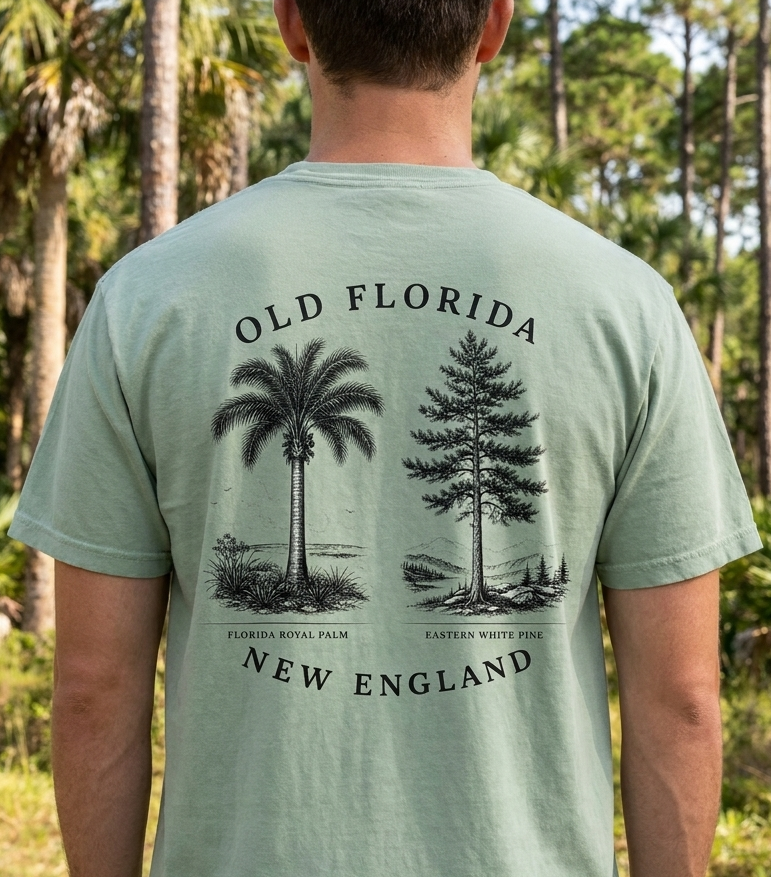 Palm & Pine T-Shirt back design, head-on, model outdoors